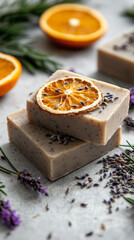 Handmade artisanal soap bars with lavender and orange accents