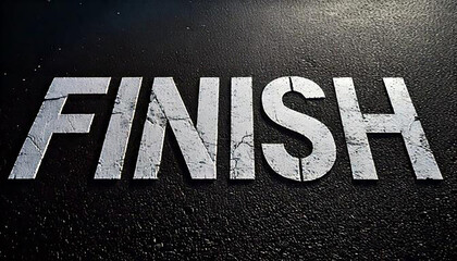 黒いアスファルトの地面に「FINISH」と描かれた文字が映し出されています。文字のひび割れた質感がリアルで、レースや挑戦の終わりを象徴しています。