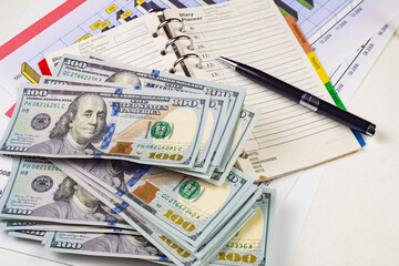 heap of one hundred dollar bills as background, close-up