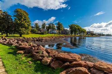 A view along rocks on the shoreline at Victoria Park in Charlottetown, Prince Edward Island, Canada in the fall