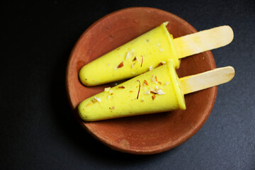 Image of a Kulfi a frozen dairy dessert from the Indian subcontinent..