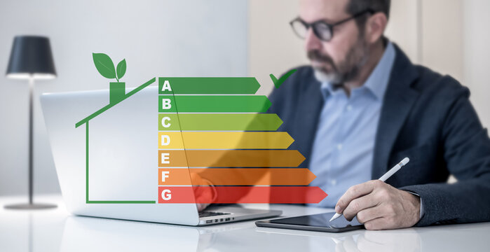 Energy efficiency application on laptop. Ecology and energy saving house concept. Home power rating