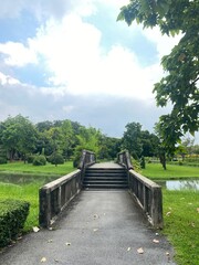 Old bridge over the river in the park.