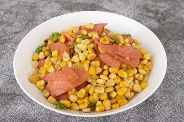 Fried corn kernels with ham sausage