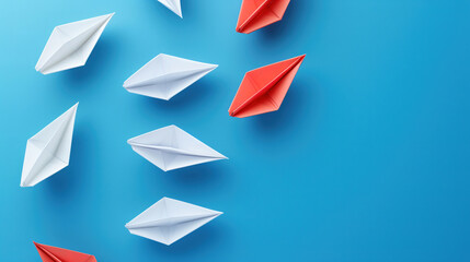Concept of Innovation: Red Paper Ship Among White Ships on Blue Background