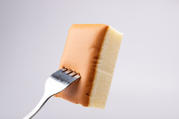 Dessert cake on a fork