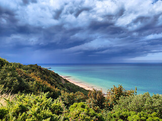 Dramatic view of the turquoise North Sea from the top of the cliffs before the storm. Sunny...