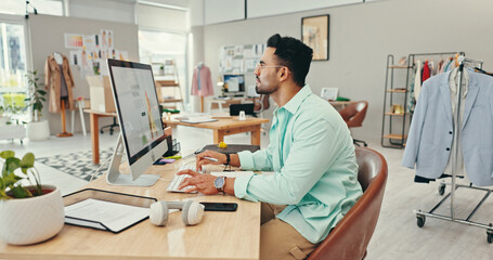 Fashion designer, online and man by computer at desk for planning clothing design and inspiration...