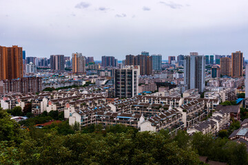 Fototapeta premium China, Sichuan, Deyang, City, urban area, Jingyang District, buildings, architectural groups, high-rise, apartment, housing, panorama, real estate, urban landscape, skyline, town, city center, buildin