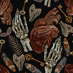 Embroidery. Skeleton hands, anatomical heart, fish bone and keys. Romantic gothic background. Seamless pattern. Template for clothes, textiles, t-shirt design
