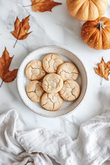 Fototapeta premium Spiced Pumpkin Cookies on Ceramic Plate with Boho Chic Fall Decor