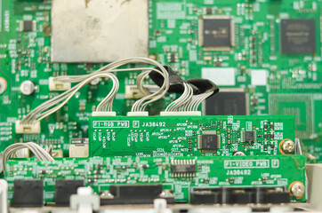  Electronic circuit control panel with wires and connectors distributing functions to different parts. Selective focus.