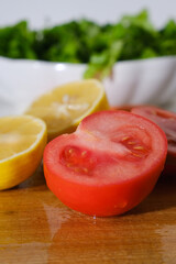 tomato and onion on cutting board