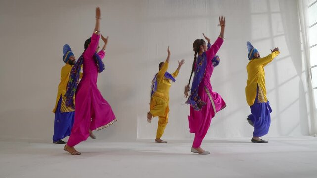 Sikh People performing bhangra during Baisakhi celebration