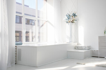 white room wth chair day light