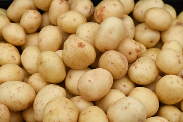 Clean washed fresh potatoes background