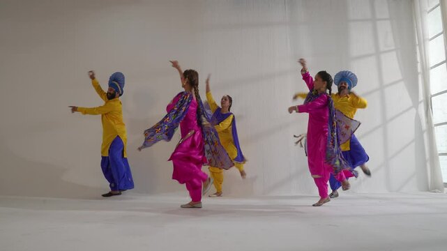 Sikh People performing bhangra during Baisakhi celebration
