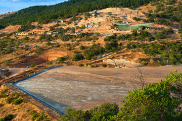 Tailings and a small processing plant of an underground gold mine in Chile.