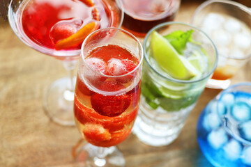 Selection of alcoholic drinks. Set of wine, brandy, liqueur, grappe, cocktail, mojito, cognac, whiskey in glasses. Large variety of alcohol and spirits for making cocktails and drink 