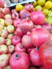 red apples and pomegranates