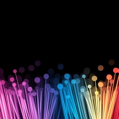 Fiber optic data system concept. Vibrant abstract background featuring colorful light trails and bokeh effects against a black backdrop.