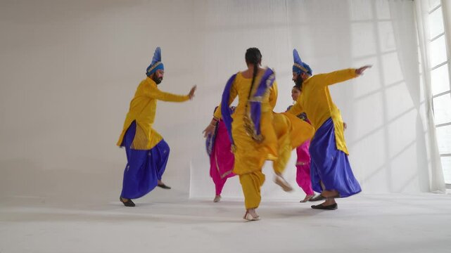 Sikh People performing bhangra during Baisakhi celebration