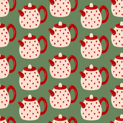 Seamless pattern with red teapots decorated with heart on a green background in flat style. Ideal for textile, wallpaper and wrapping paper with a cozy and charming theme.