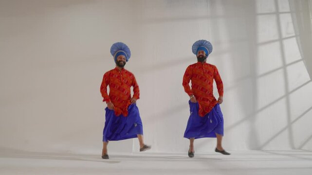 Sikh Men performing bhangra during Baisakhi Celebration