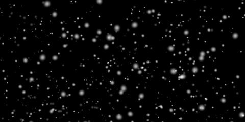 黒背景に白色のぼやけた粒子の抽象的な背景素材