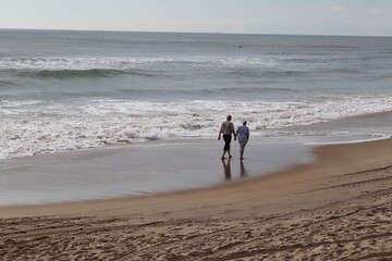 couple walking on the beach