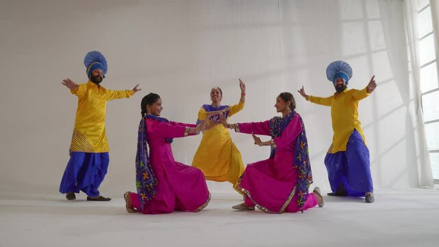 Sikh People performing bhangra during Baisakhi celebration