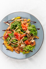 Di Mare salad: A refreshing mix of vegetables, herbs, and seafood, offering a taste of the Mediterranean sea.