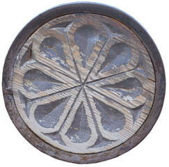round wooden medallion with ornament