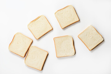 Sliced toast bread on white background. Delicious breakfast.