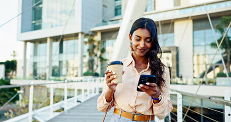 Happy woman, phone and coffee with bridge in city for social media, communication or reading news. Female person, employee and travel with drink or mobile smartphone for online chat, browsing or app