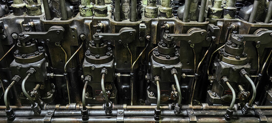 Close up view of fuel pumps of old 6 cylinder diesel engine