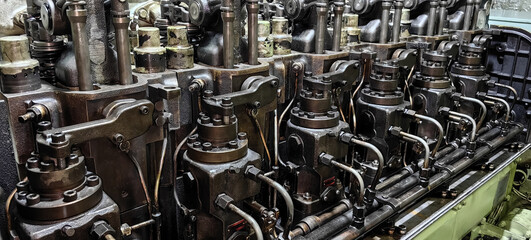 Close up view of fuel pumps of old 6 cylinder diesel engine