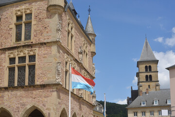 City Hall and old town center of Echternach, Luxembourg with Flags