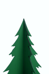 Closeup view of a Christmas tree miniature on a white background