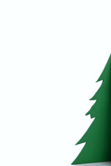 Closeup view of a Christmas tree miniature on a white background