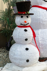 big Christmas snowman in the outdoor at vertical composition