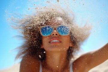 Naklejka premium She threw the sand.