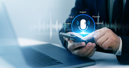 Translations using the microphone voice.Translator language course and education. Businessman use smartphone for translate language.Translate languages technology concept. © Mer_Studio
