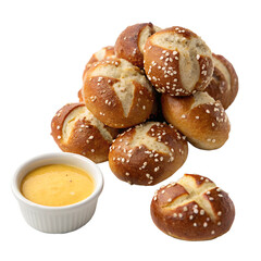A handful of soft pretzel bites sprinkled with coarse salt, arranged in a casual pile with a cup of mustard sauce, isolated on transparent background.