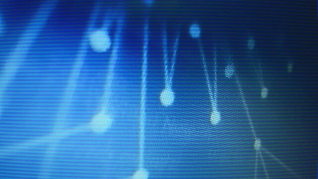 Closeup of computer monitor with blue animated scientific diagrams showing connected dots. Visible interlace lines. Flickering vintage 80s 90s vhs style video. Sci-fi computer background.