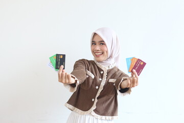 Smiling Muslim Woman Showing Multiple Credit Cards, Online Shopping, E-commerce, Fintech, Banking, Finance, Happy Customer, Easy Payment, Digital Transaction