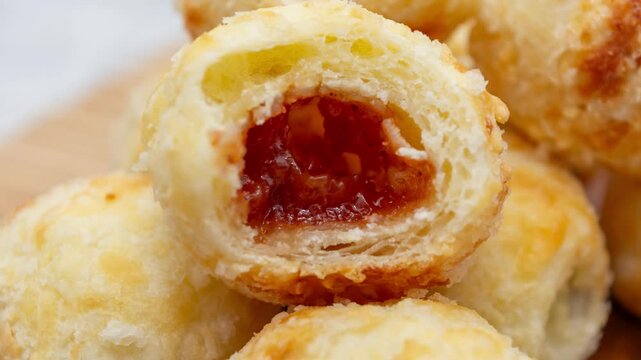 delicious brazilian p&atilde;o de queijo stuffed with goiabada