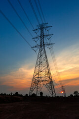 Electricity transmission pylon. high-voltage power lines at sunset. high voltage post