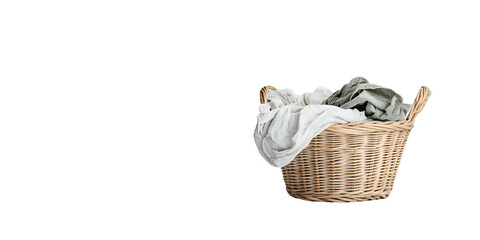 Wicker Laundry Basket with Folded Clothes Isolated on White