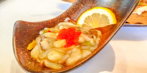 Tako wasabi, octopus fermented in wasabi and salt in Japanese style, in restaurant